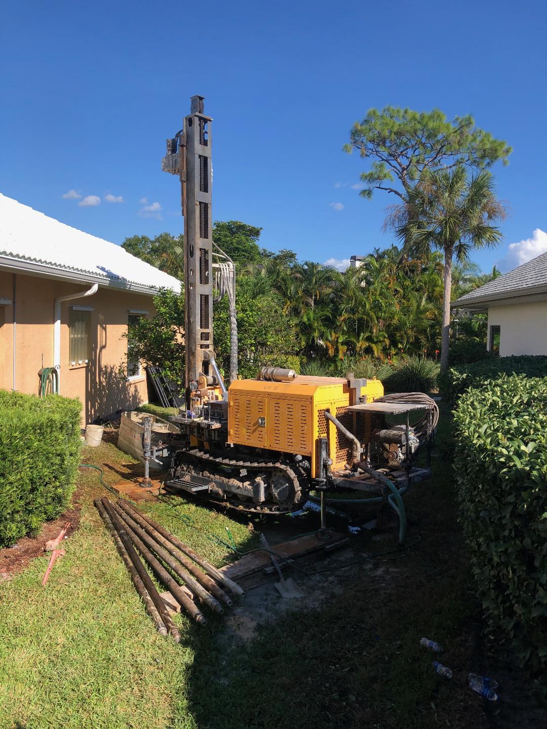 Well drilling rig on job site